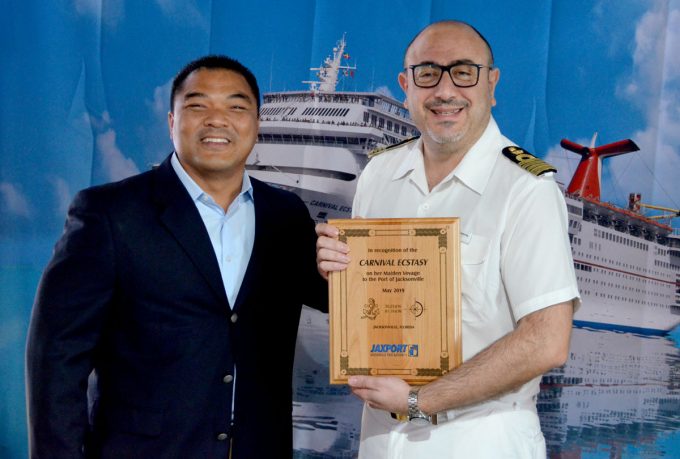 JAXPORT COO presents plaque to Carnival Cruise Line Captain