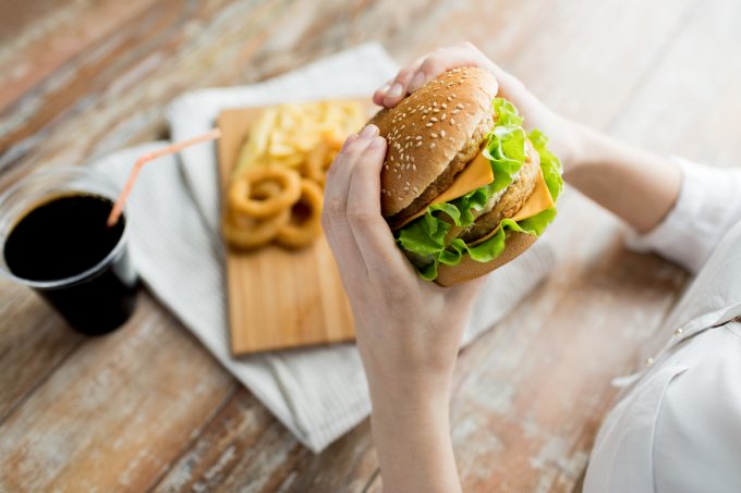 Person eating fast food