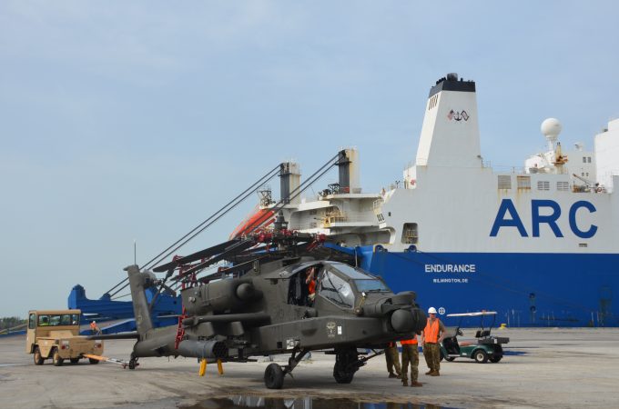 Helicopter being loaded onto a ship at JAXPORT