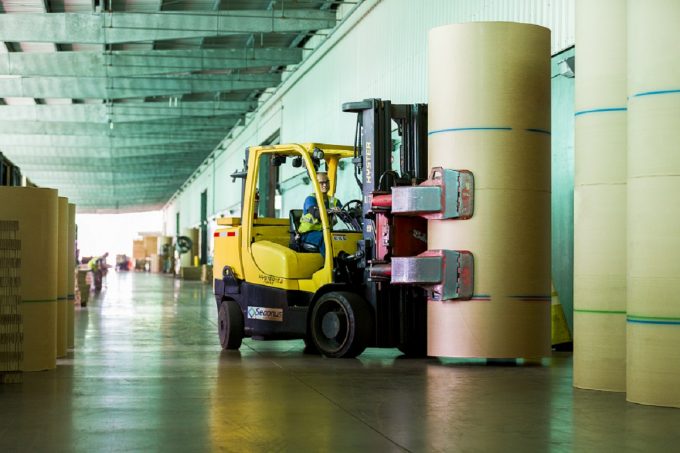 Forklift moving paper rolls at JAXPORT's Talleyrand Marine Terminal