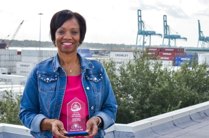 JAXPORT's wellness committee chair holds the port's wellness award