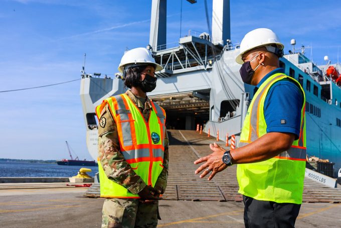 JAXPORT Chief Operating Officer Fred Wong speaks with a representative from the Military