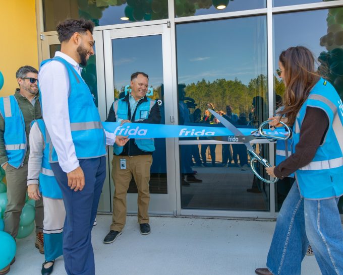 Frida ribbon cutting
